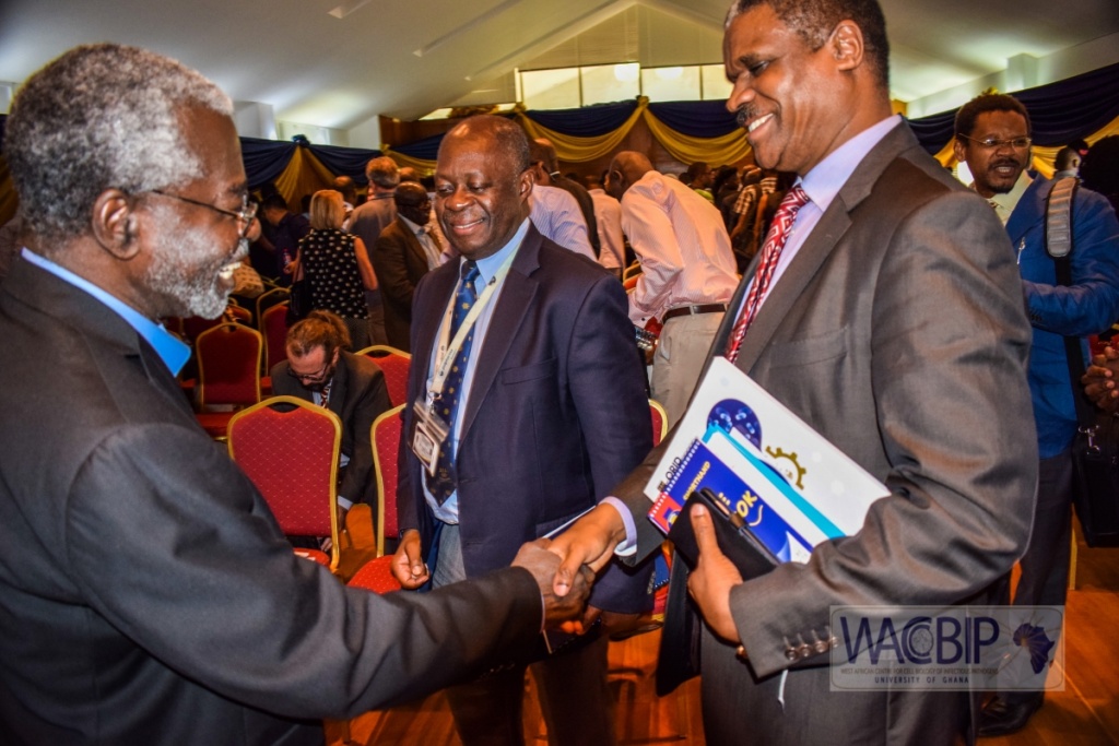 Dr. Abraham Hodgson, Dr. Owen Laws Kaluwa and Prof. Kwadwo Ansah Koram exchanging pleasantries after the programme